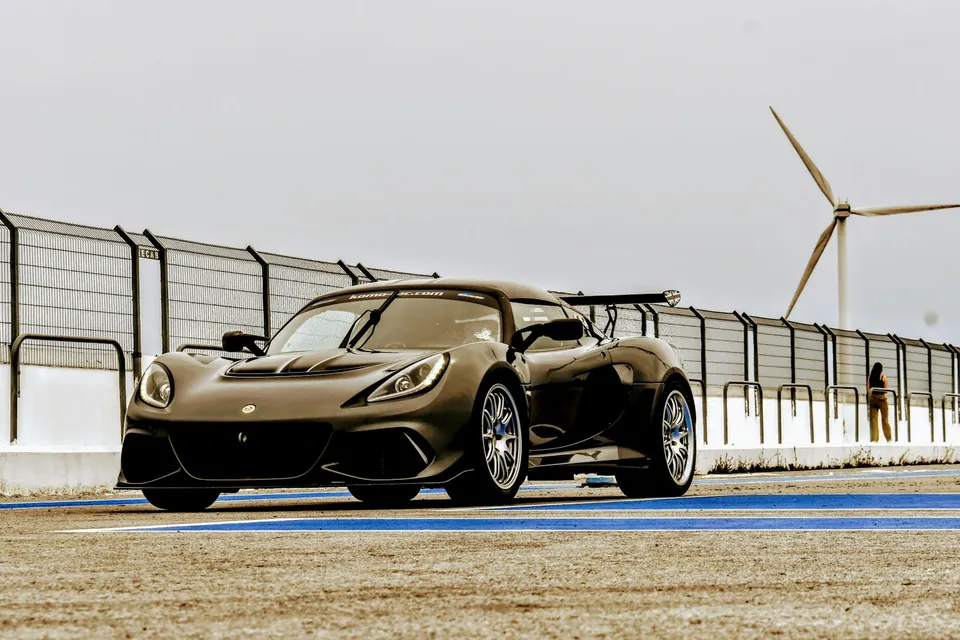 A lightweight sports car on a country road — illustrative photograph